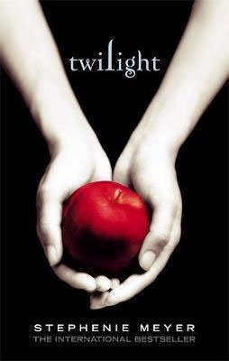 Books Set In Every State Washington, Twilight by Stephanie Meyer, book cover with pale white hands holding a vibrant red apple