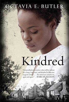 Kindred by Octavia E Butler book cover with young black woman's face and wooden houses that she is looking down upon
