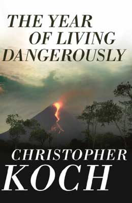 The Year Of Living Dangerously by Christopher Koch book cover with volcano eruption and red lava