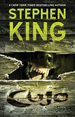 Cujo by Stephen King book cover with angry dog snout through broken wooden fence